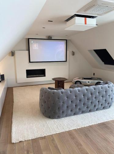 TV a/nebo společenská místnost v ubytování Business Accommodation Luxury Loft