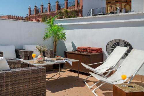 Posedenie v ubytovaní Magno Apartments Fabiola Luxury House