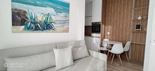 TV a/nebo společenská místnost v ubytování Wavefront Apartment 2