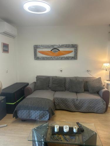 a living room with a couch and a table at Apartment zona Naturista in Vera