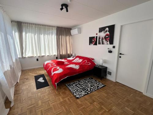 Cama o camas de una habitación en GT Lounge