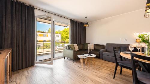 Posezení v ubytování Jantar Resort Flatbook - Wynajem Apartamentów nad Morzem