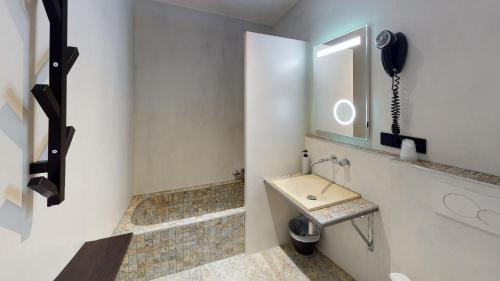 Koupelna v ubytování Hotel Adler
