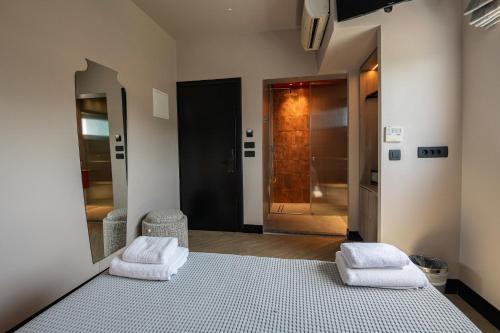 Postel nebo postele na pokoji v ubytování Hotel Coral