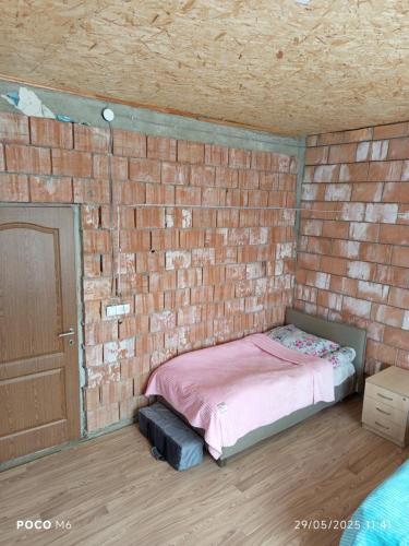 Ein Bett oder Betten in einem Zimmer der Unterkunft Guest house River side