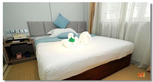 Pristine Hotelにあるベッド