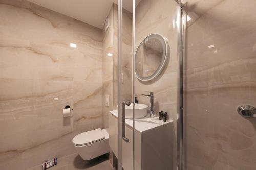 Ένα μπάνιο στο Apartman Pinjuh