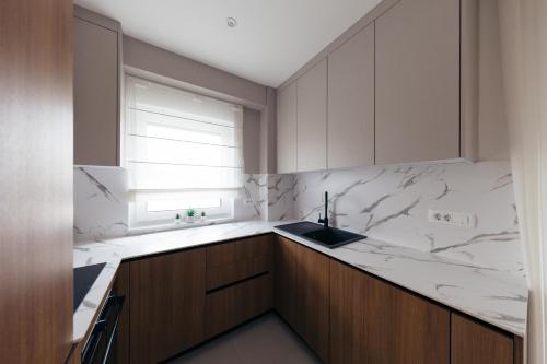 Η κουζίνα ή μικρή κουζίνα στο Apartman Pinjuh