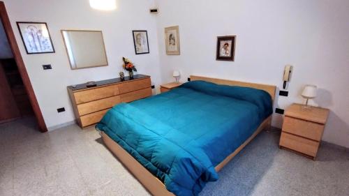 Postel nebo postele na pokoji v ubytování Grande Bilocale con giardino