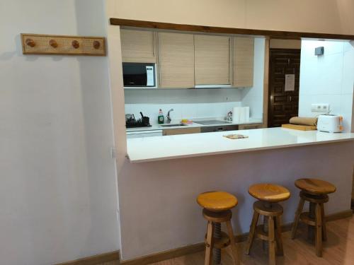 Kuchyň nebo kuchyňský kout v ubytování Ibón de Piniecho