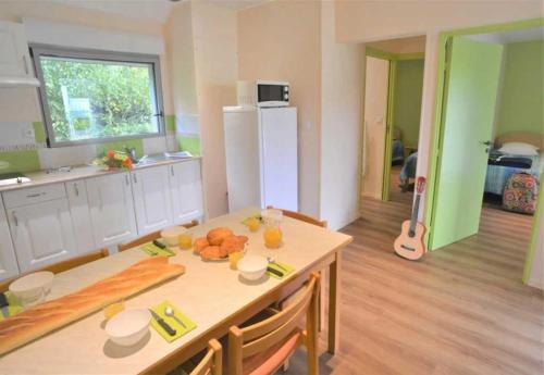 Kuchyň nebo kuchyňský kout v ubytování Camping 3 étoiles - Piscine - eehafa