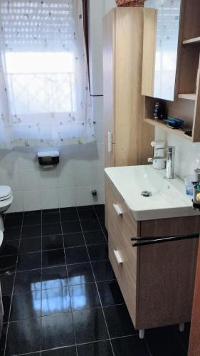 Koupelna v ubytování Grande Bilocale con giardino