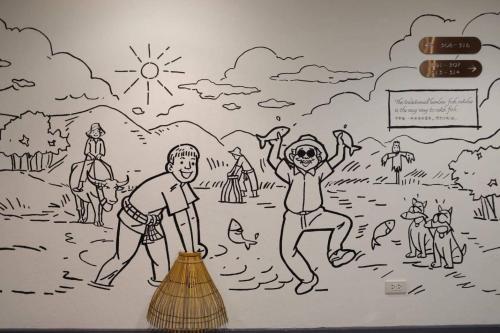 a drawing of people playing in the beach at Boutique Poo-Yai Lee in Bangkok