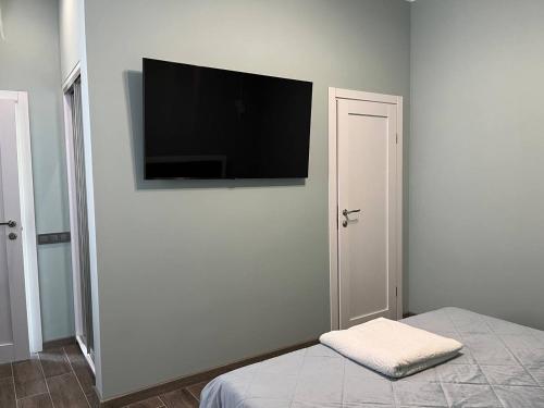 TV a/nebo společenská místnost v ubytování Green Hall Hotel