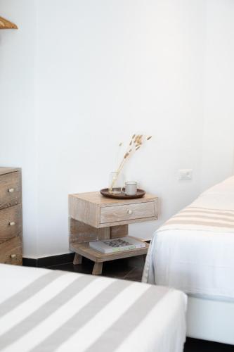 Acrogiali Beachfront Hotel Mykonosにあるベッド