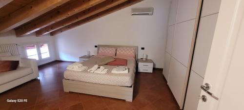 Postel nebo postele na pokoji v ubytování Relax a due passi dal castello