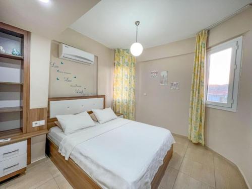 Ένα ή περισσότερα κρεβάτια σε δωμάτιο στο Paddys Apartments Ovacık