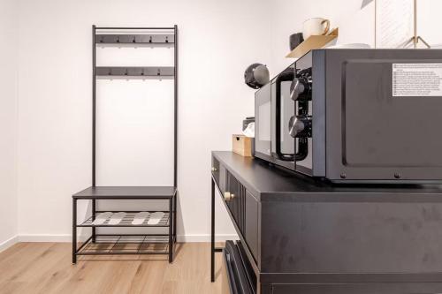 Una cocina o zona de cocina en LoveRoom avec balnéo privative