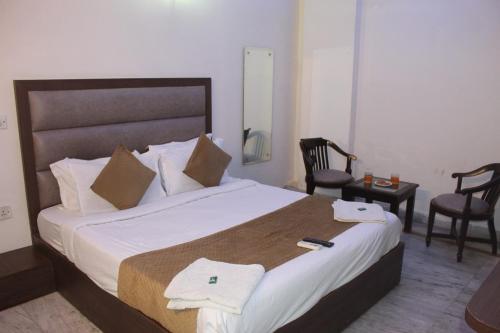 Ένα ή περισσότερα κρεβάτια σε δωμάτιο στο New South Paradise - Near Nehru Place