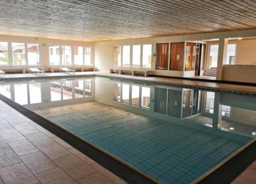 Πισίνα στο ή κοντά στο Ferienwohnung Gipfelglück 931 mit Hallenbad und Sauna
