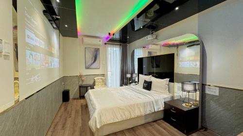 Postel nebo postele na pokoji v ubytování M&H Lux Hotel