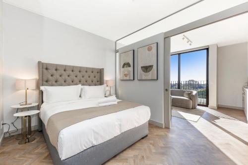 Ένα ή περισσότερα κρεβάτια σε δωμάτιο στο Easy Stay-One Rosebank