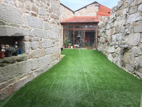 Zahrada ubytování A casita das Pegas