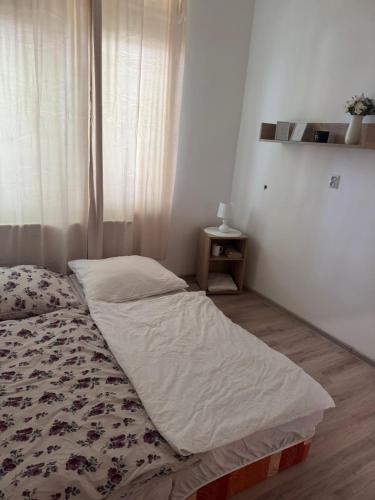 Postel nebo postele na pokoji v ubytování Perfekt group