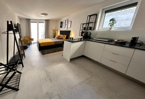 Η κουζίνα ή μικρή κουζίνα στο Charming coastal apartment in Komarna