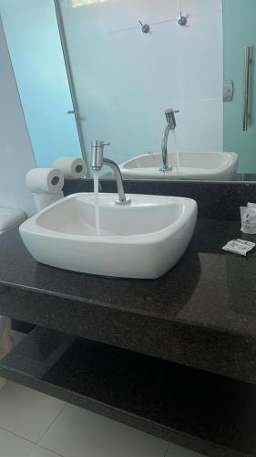 Bilik mandi di Pousada do Rio Turvo
