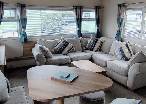 a living room with a couch and a coffee table at The Chillout in Knaresborough