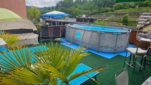 a view of a swimming pool on a roof at Miuti Residence in Triberg