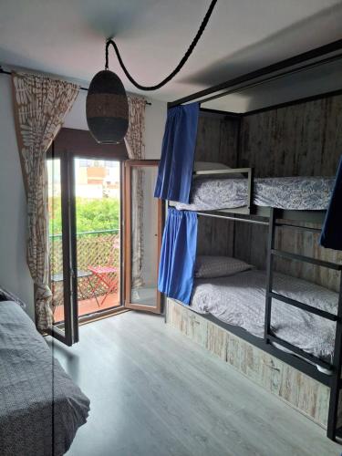 Postel nebo postele na pokoji v ubytování La Pita City House