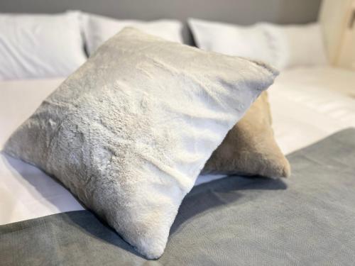 Una cama o camas en una habitación de ブレイブベース糸島