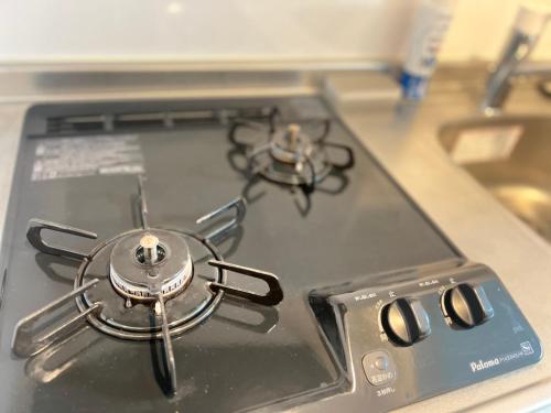 Una cocina o cocineta en ブレイブベース糸島