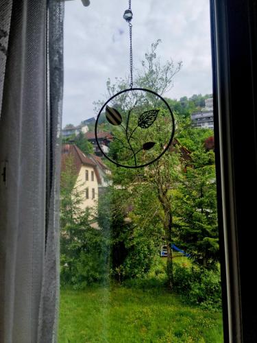 a window with a view of a yard at Holiday Apartment near Triberg Waterfall in Triberg