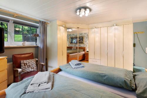 Katil atau katil-katil dalam bilik di Ferienhaus Rita in Falkenburg
