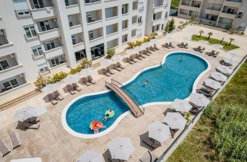 an overhead view of a swimming pool in a hotel at ANI apartment 1 in Ulcinj