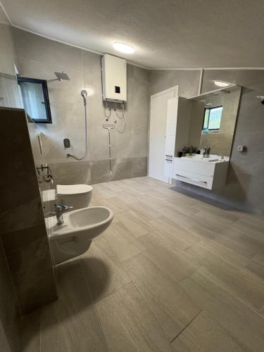 Koupelna v ubytování Apartmani Neum