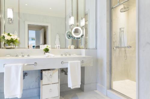 a bathroom with a sink and a shower at Hotel Lungarno - Lungarno Collection in Florence