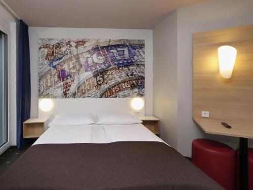 Postel nebo postele na pokoji v ubytování B&B HOTEL Berlin-Alexanderplatz