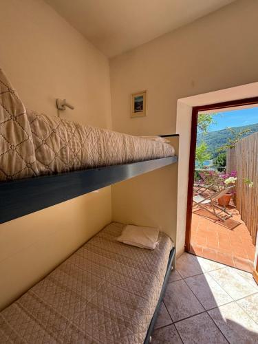 Postel nebo postele na pokoji v ubytování Casa Perla e Conchiglia