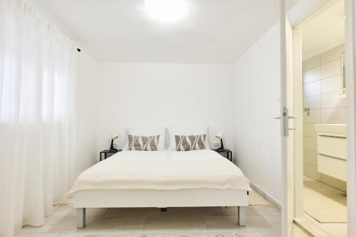 Letto o letti in una camera di Villa Aurea Murter
