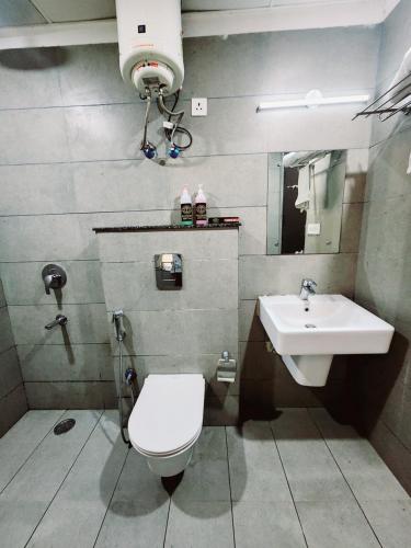 Koupelna v ubytování Tipsyy Inn Suites 007
