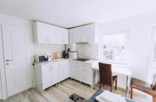 Dapur atau dapur kecil di Apartamente TRS