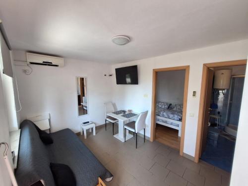 Η κουζίνα ή μικρή κουζίνα στο Apartma 4