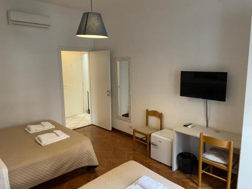 TV a/nebo společenská místnost v ubytování Good Rooms