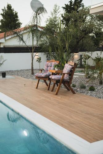 Πισίνα στο ή κοντά στο The olive Nest Villa by "Elite"