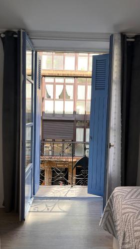 an open door to a room with a window at vivienda turística Irún in Irún