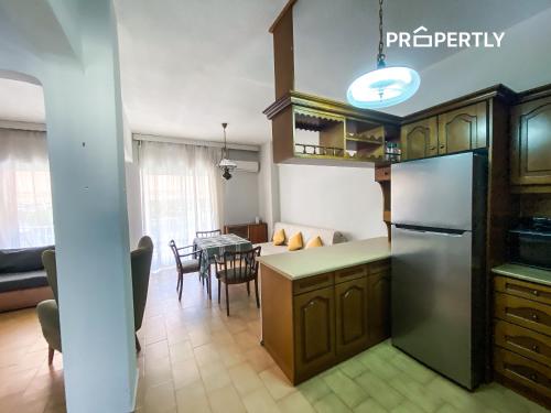 Η κουζίνα ή μικρή κουζίνα στο Sunset & Sea Family Apartment